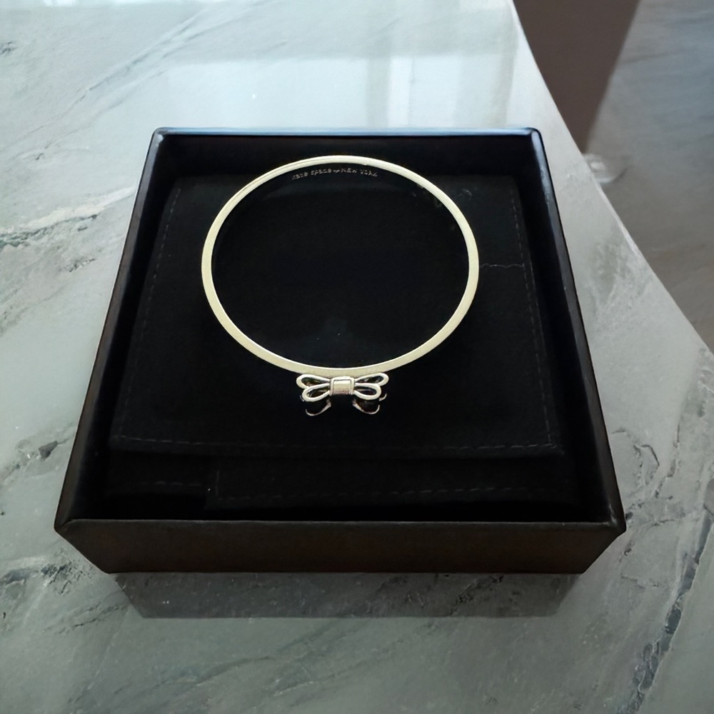 Kate Spade New York “Moon River” Silver Bow Bangle – Never Worn